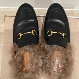 Size 38 Gucci Loafers black leather with fur inside.